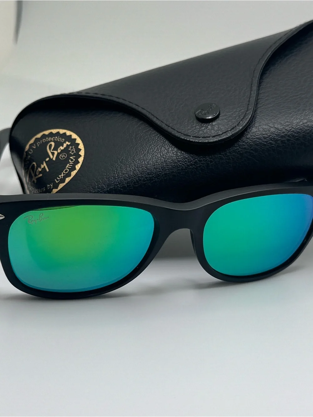 Ray-Ban Matte Black Frame Sunglasses with Blue-Green Mirrored Lenses